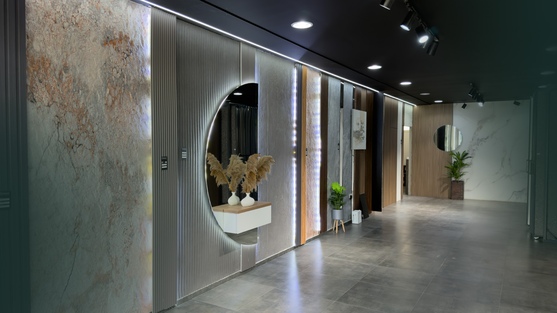 Showroom display of decorative wall panels with LED accent lighting